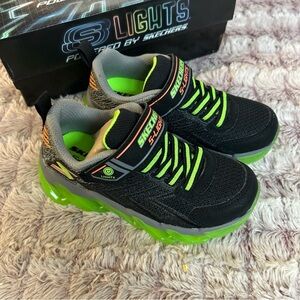 S lights powered by Skechers sneakers size 11